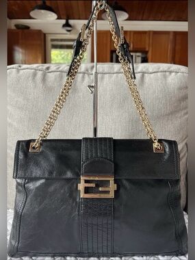 Fendi mama baguette, black leather, gold detailing and chain